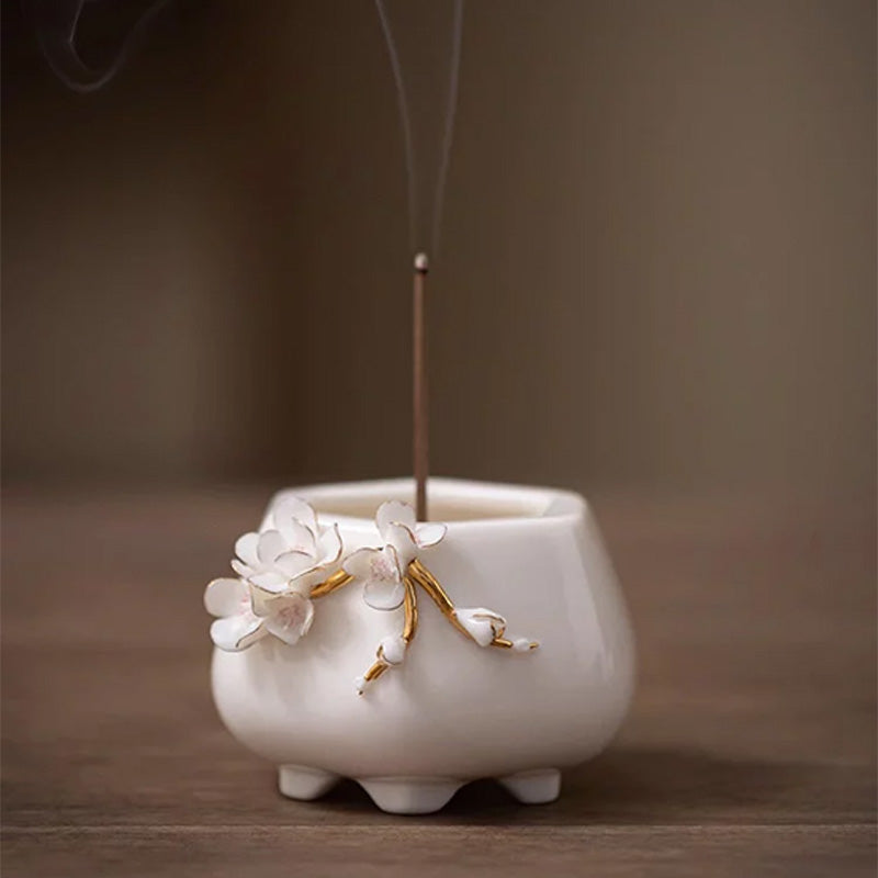 Hand-sculpted floral white porcelain aroma burner and creative ceramic incense stick holder