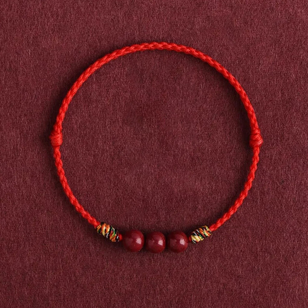 Cinnabar bean red cord bracelet