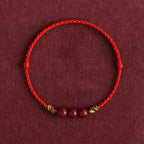 Cinnabar bean red cord bracelet