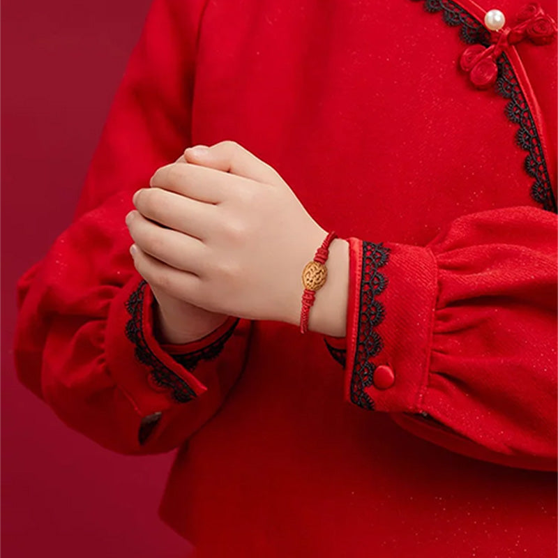 Peach wood red rope