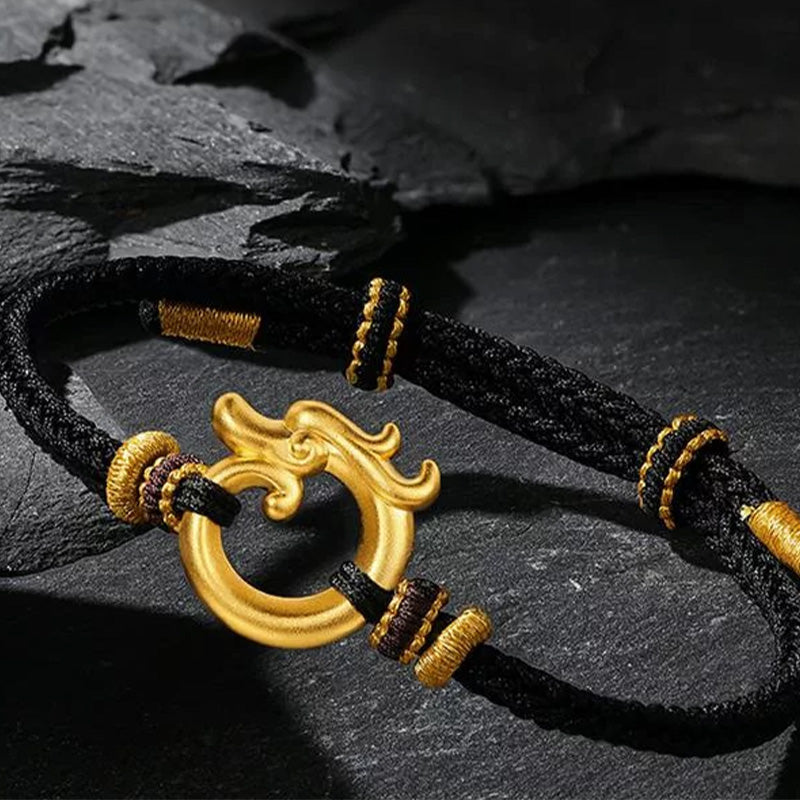 Gold bracelet with dragon motif