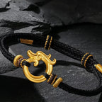 Gold bracelet with dragon motif