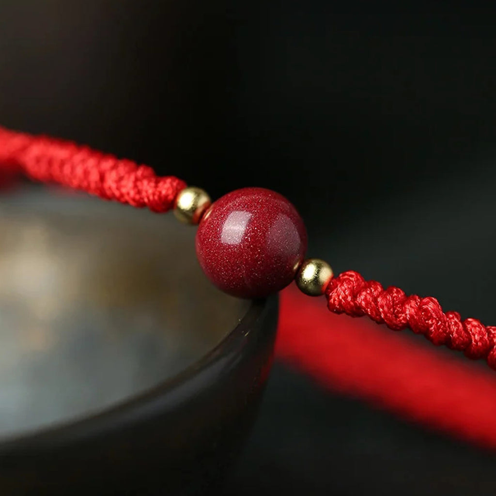 Cinnabar bean red cord bracelet