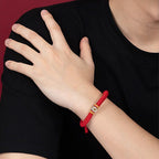 Buddhist prayer beads red string