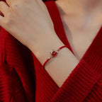 "Hug-a-Saurus" Red Cord Bracelet