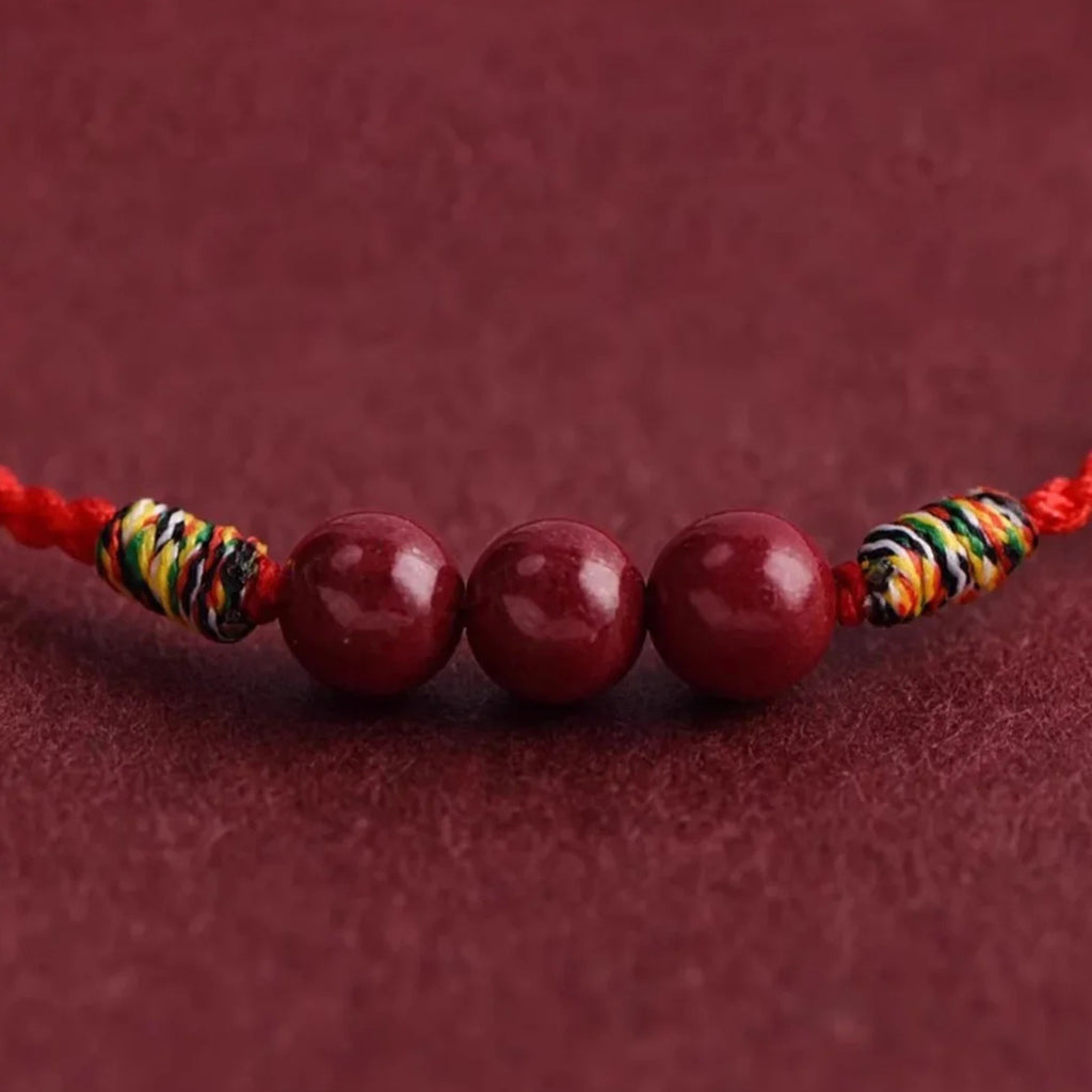 Cinnabar bean red cord bracelet