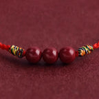 Cinnabar bean red cord bracelet