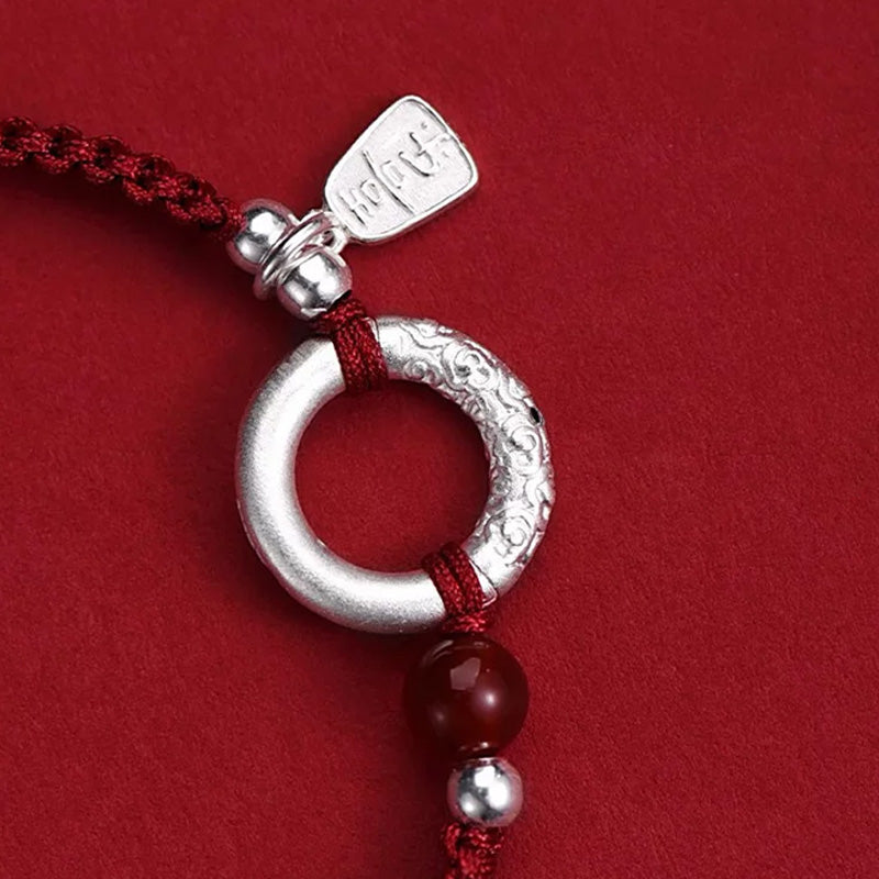 Sterling Silver Safety Buckle on a Red Cord