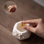 Hand-sculpted floral white porcelain aroma burner and creative ceramic incense stick holder