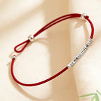 Small silver nugget and red cord anklet