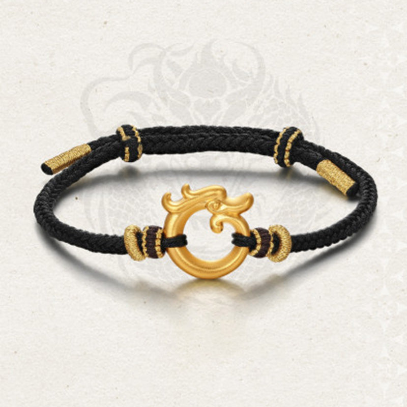 Gold bracelet with dragon motif