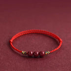 Cinnabar bean red cord bracelet