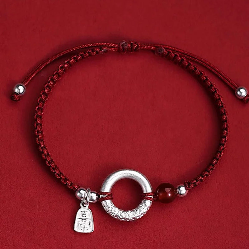 Sterling Silver Safety Buckle on a Red Cord