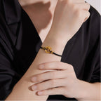 Gold bracelet with dragon motif