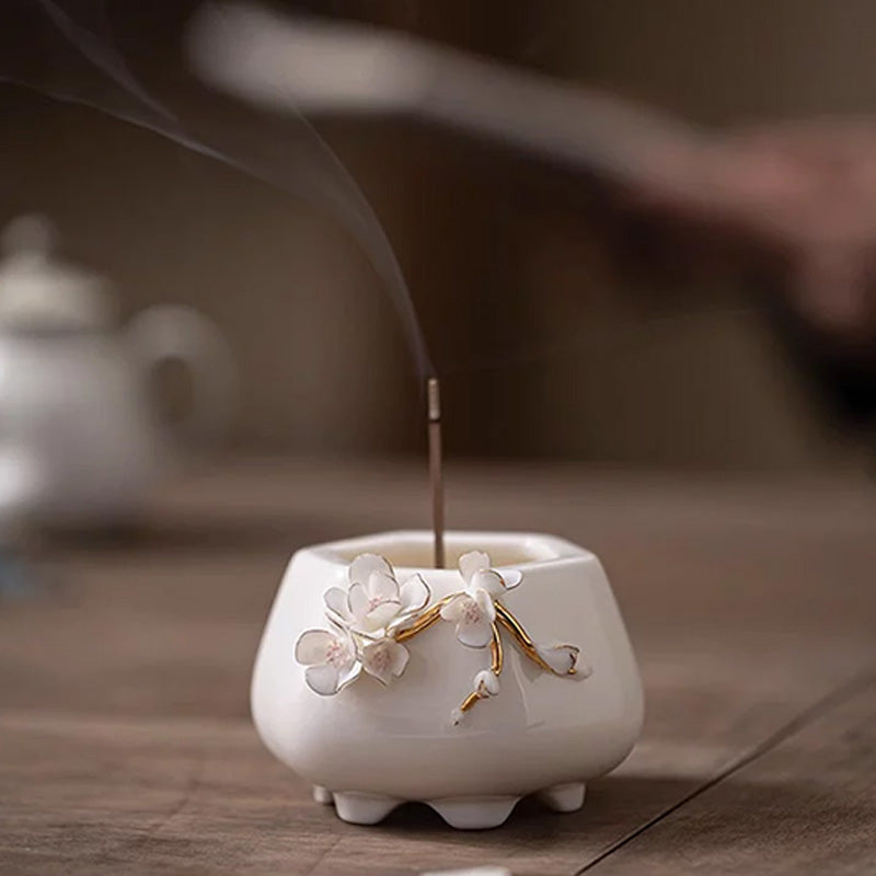 Hand-sculpted floral white porcelain aroma burner and creative ceramic incense stick holder