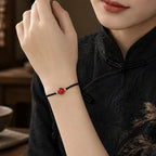 Cinnabar bean red cord bracelet