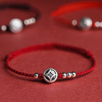 Coin Red String