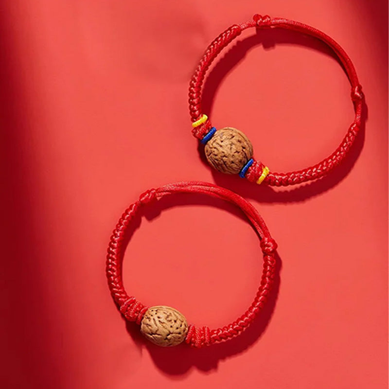 Peach wood red rope