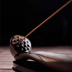 Zen-style ceramic lotus incense holder