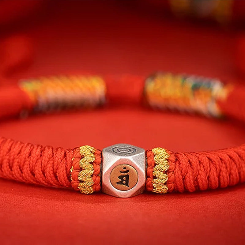 Buddhist prayer beads red string
