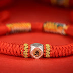 Buddhist prayer beads red string