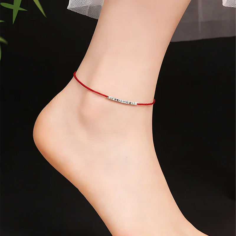 Small silver nugget and red cord anklet