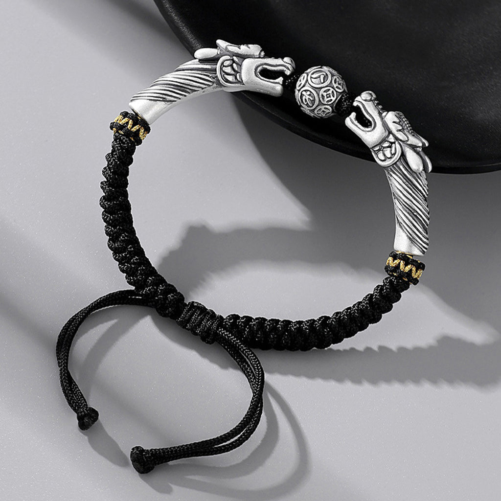 Black cord featuring two dragons playing with a pearl