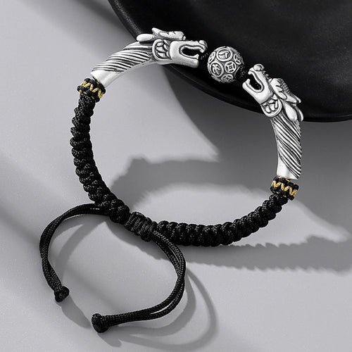 Black cord featuring two dragons playing with a pearl