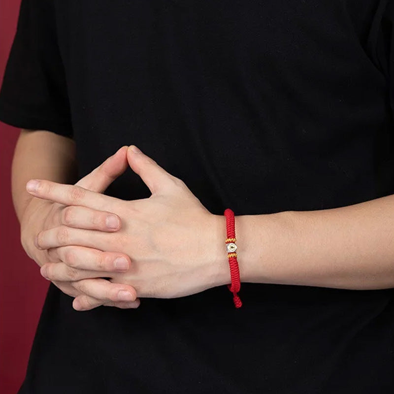 Buddhist prayer beads red string