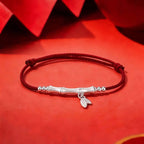 Bamboo-shaped red rope