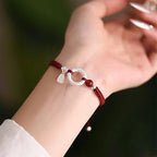 Sterling Silver Safety Buckle on a Red Cord