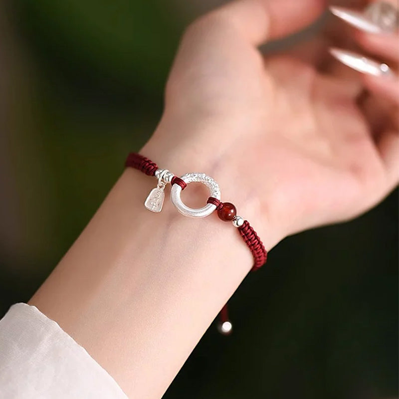 Sterling Silver Safety Buckle on a Red Cord
