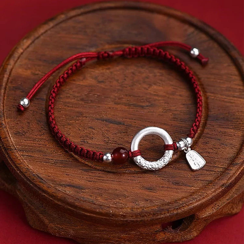 Sterling Silver Safety Buckle on a Red Cord