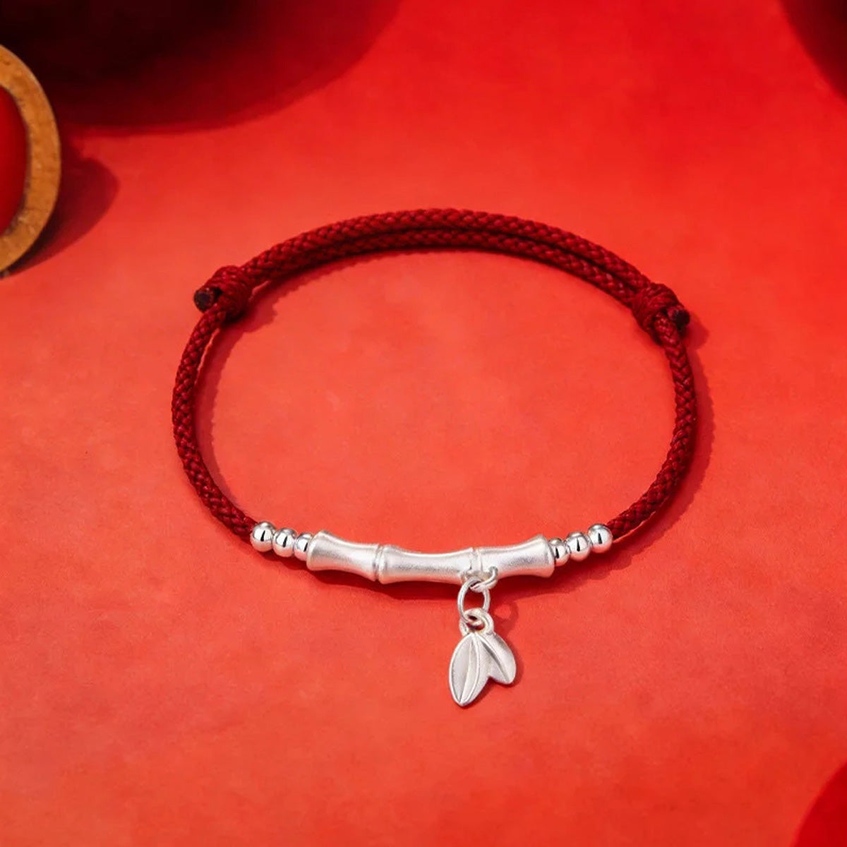 Bamboo-shaped red rope
